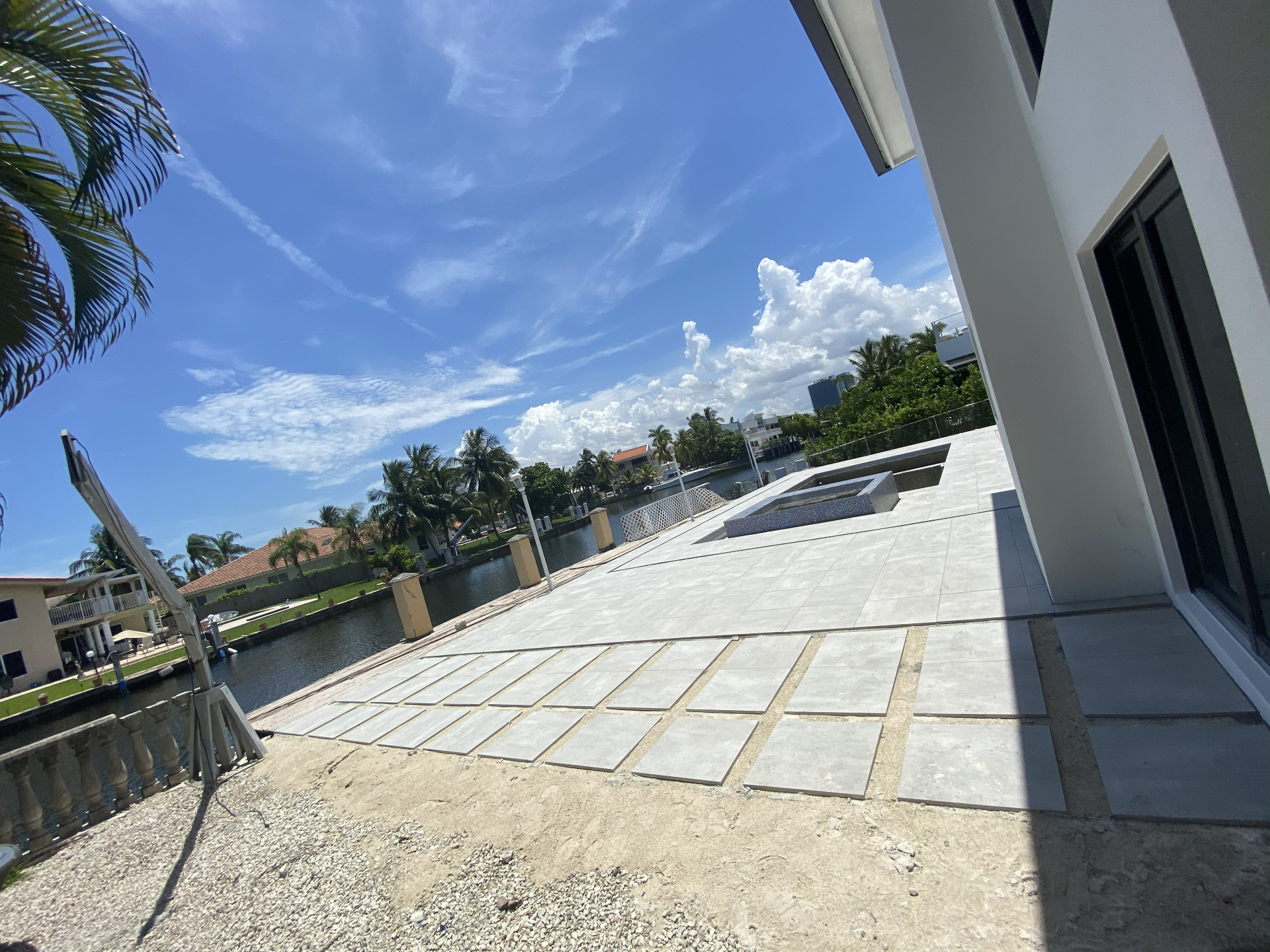 Luxury poolside turf installation South Florida before and after before